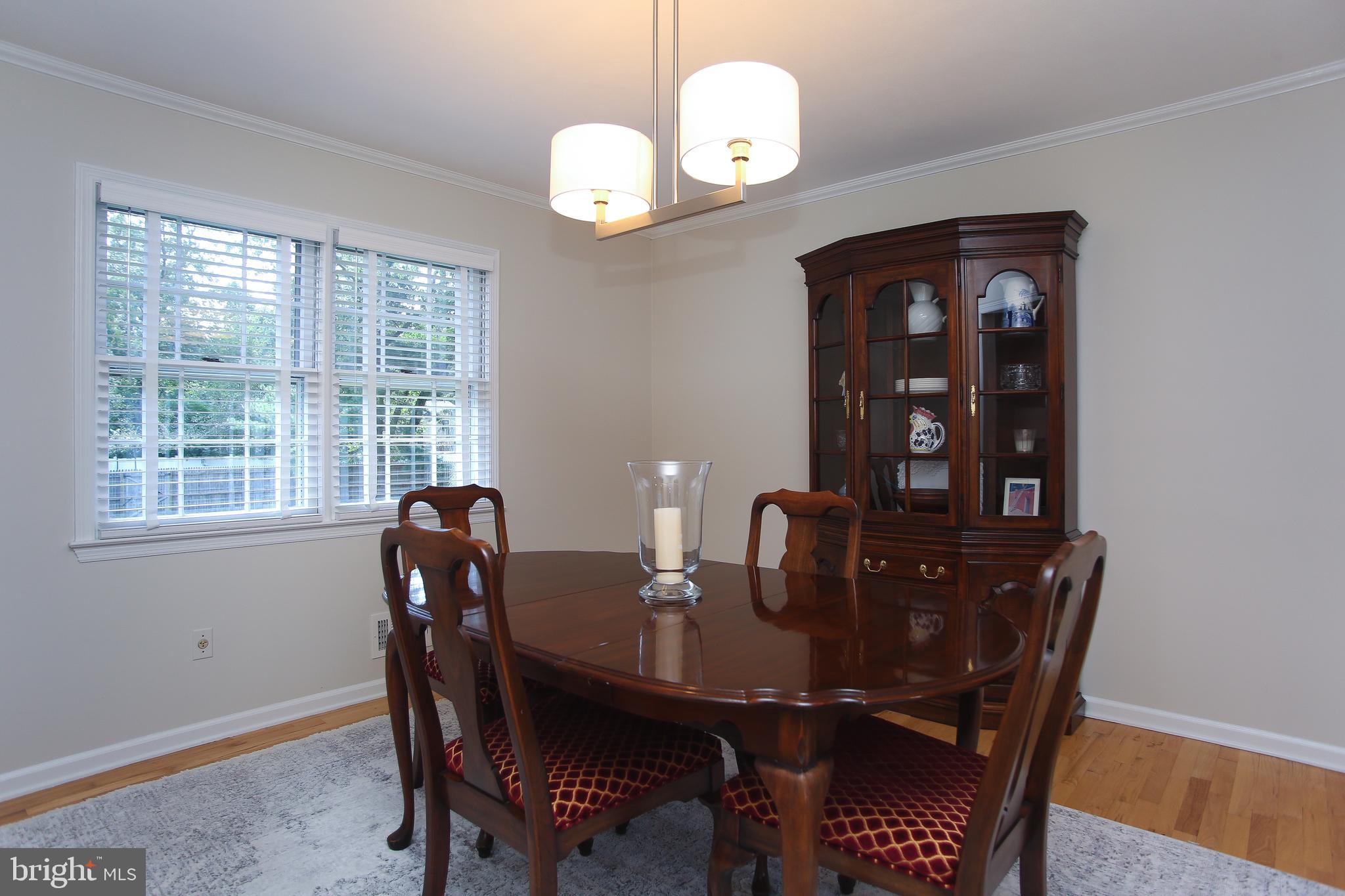 4 Indian Run Road Princeton Junction, NJ 08550 - Photo 7 of 43 a view of a dining room with a table and chairs