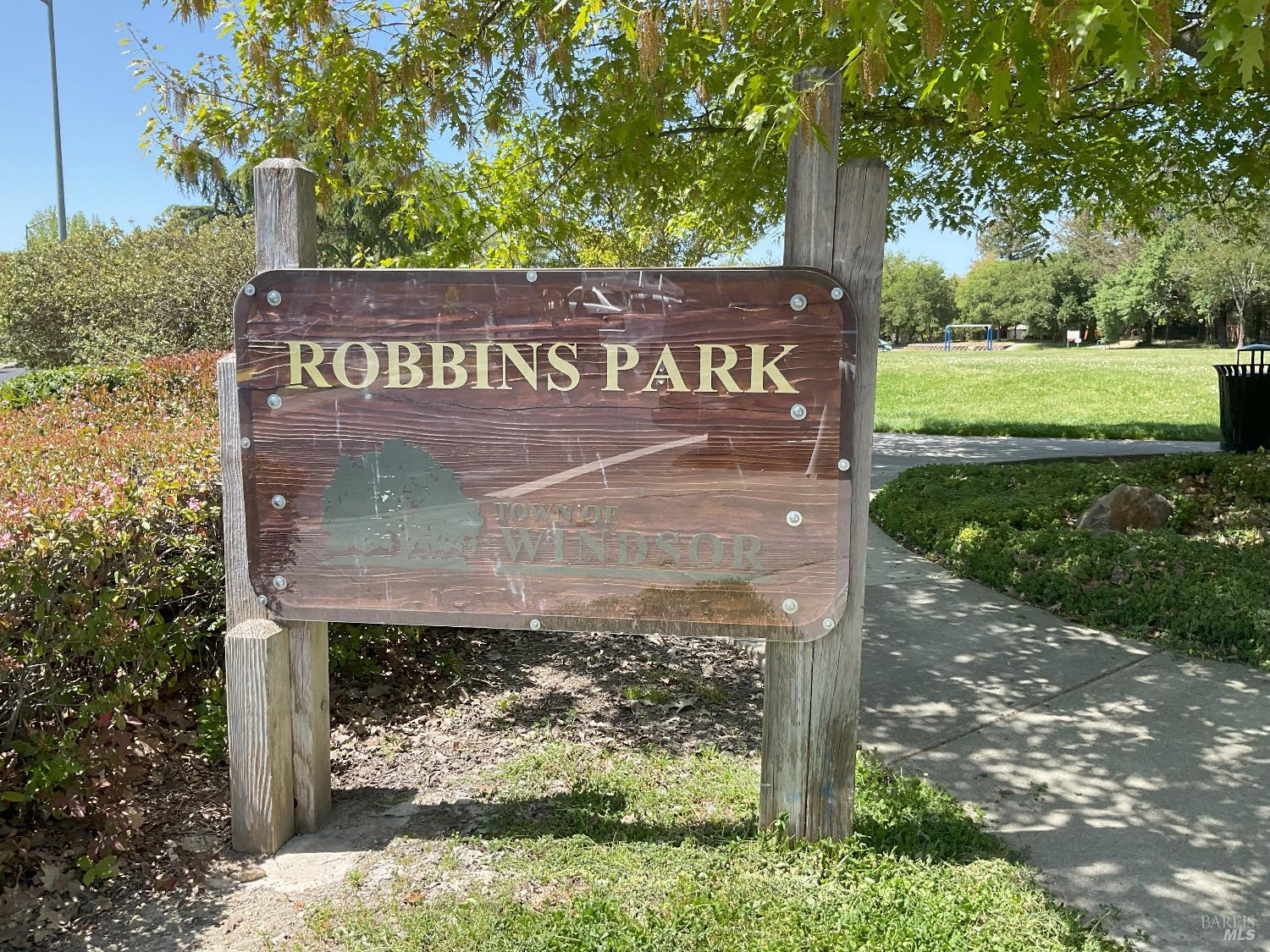 345 Wilson Lane Windsor, CA 95492 - Photo 14 of 18 a view of a street sign under a large tree
