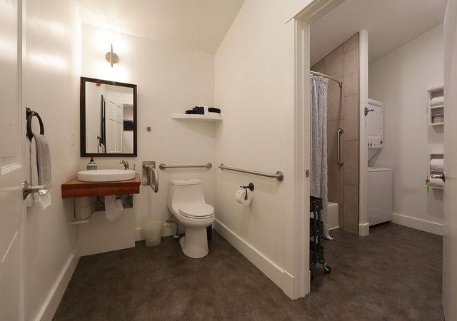 a view of a balcony with lots of gym equipment