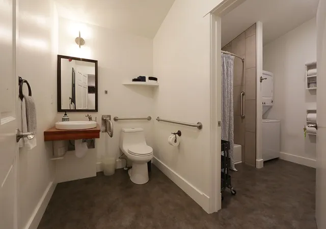 a view of a balcony with lots of gym equipment