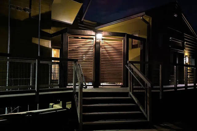 a bedroom with bed and window