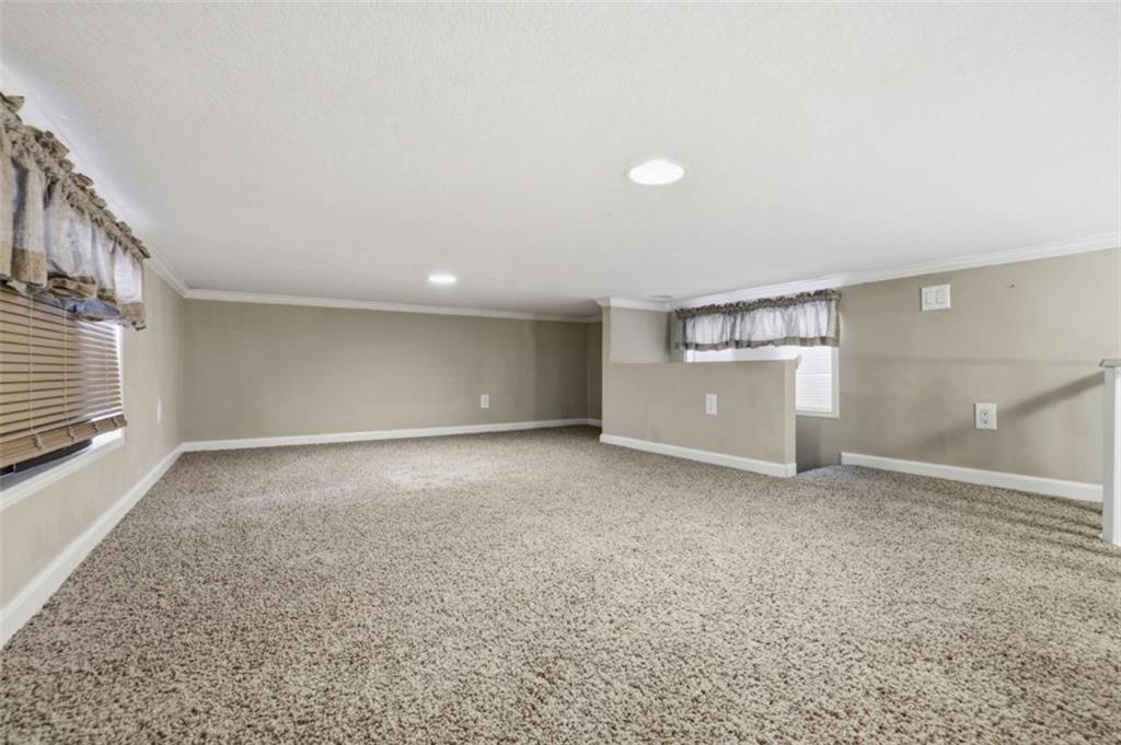 96 Stag Leap Drive Cleveland, GA 30528 - Photo 15 of 42 a view of an empty room with a window