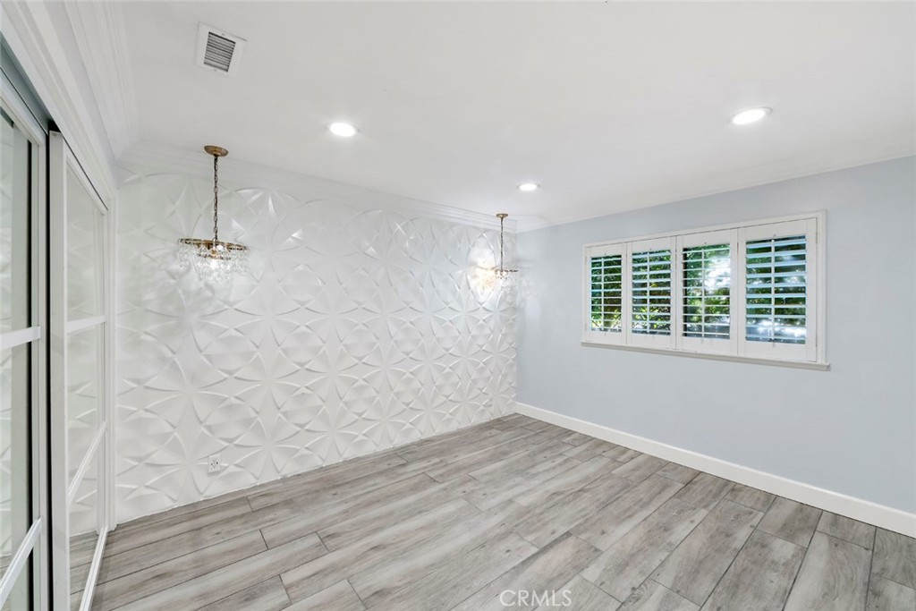 13692 Jenet Circle Santa Ana, CA 92705 - Photo 11 of 68 wooden floor in an empty room with a window