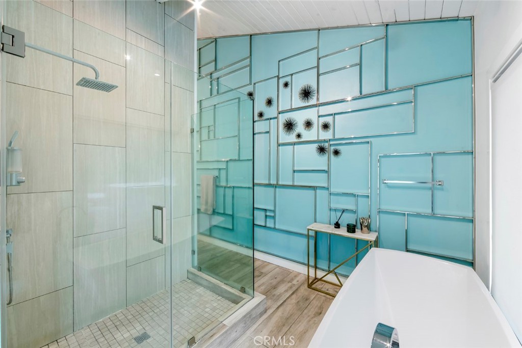 13692 Jenet Circle Santa Ana, CA 92705 - Photo 29 of 68 a bathroom with a bathtub and a shower