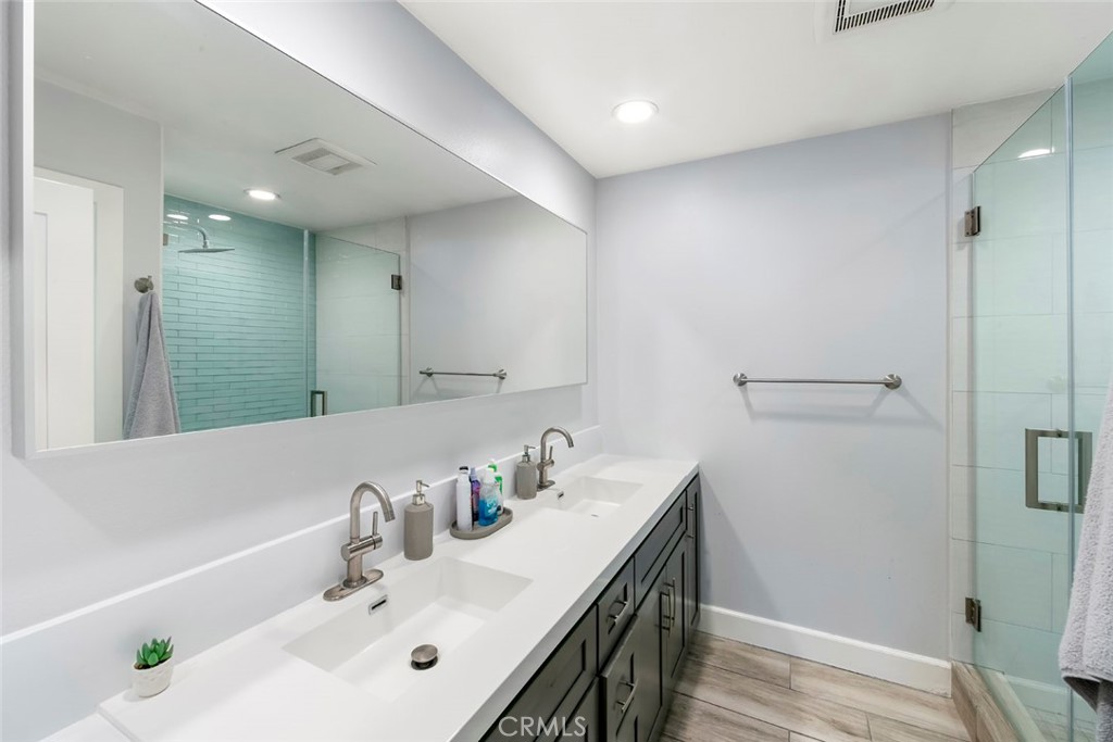 13692 Jenet Circle Santa Ana, CA 92705 - Photo 10 of 68 a bathroom with a sink and a mirror