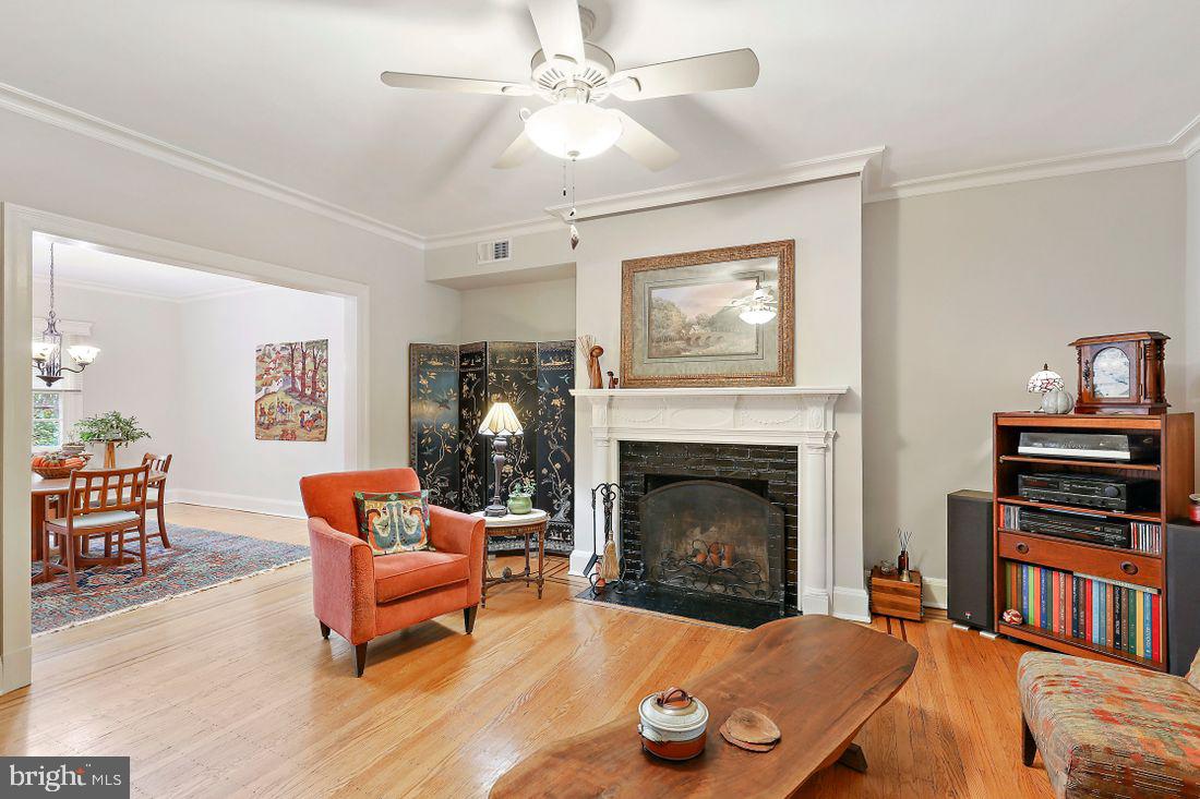 4227 Wickford Road Baltimore, MD 21210 - Photo 6 of 69 open living room with wood burning fireplace