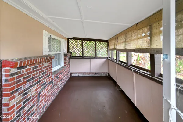 a view of kitchen with furniture and window