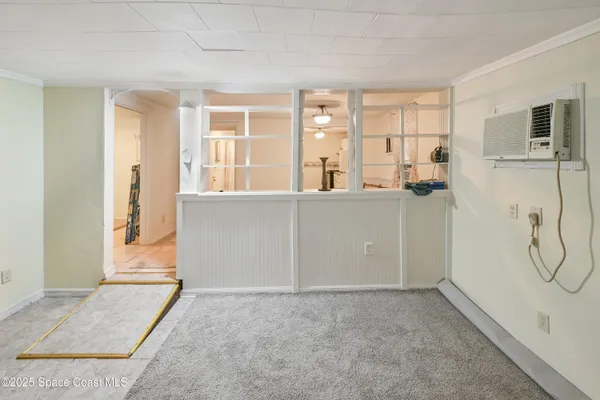 a view of an entryway with front door