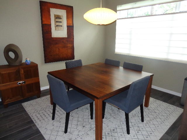 33 Lancaster Road Boynton Beach, FL 33426 - Photo 5 of 34 a view of a dining room with furniture