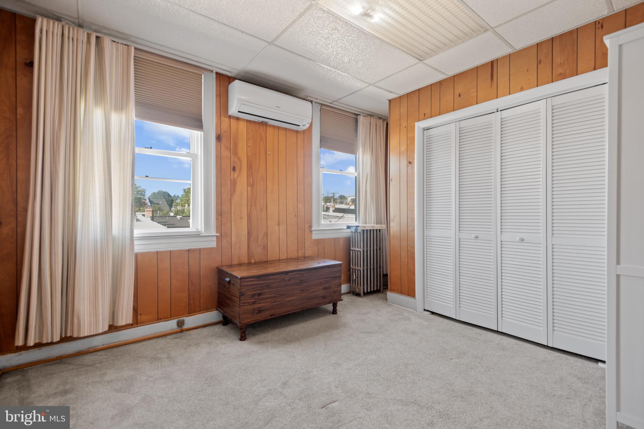 1228 West 37th Street Baltimore, MD 21211 - Photo 16 of 23 a view of room with window and ceiling fan