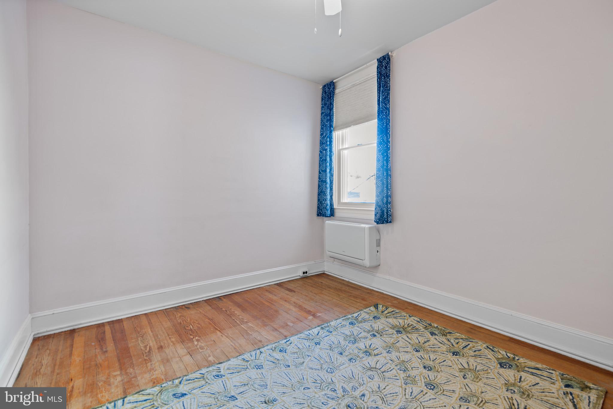 1228 West 37th Street Baltimore, MD 21211 - Photo 18 of 23 wooden floor in an empty room