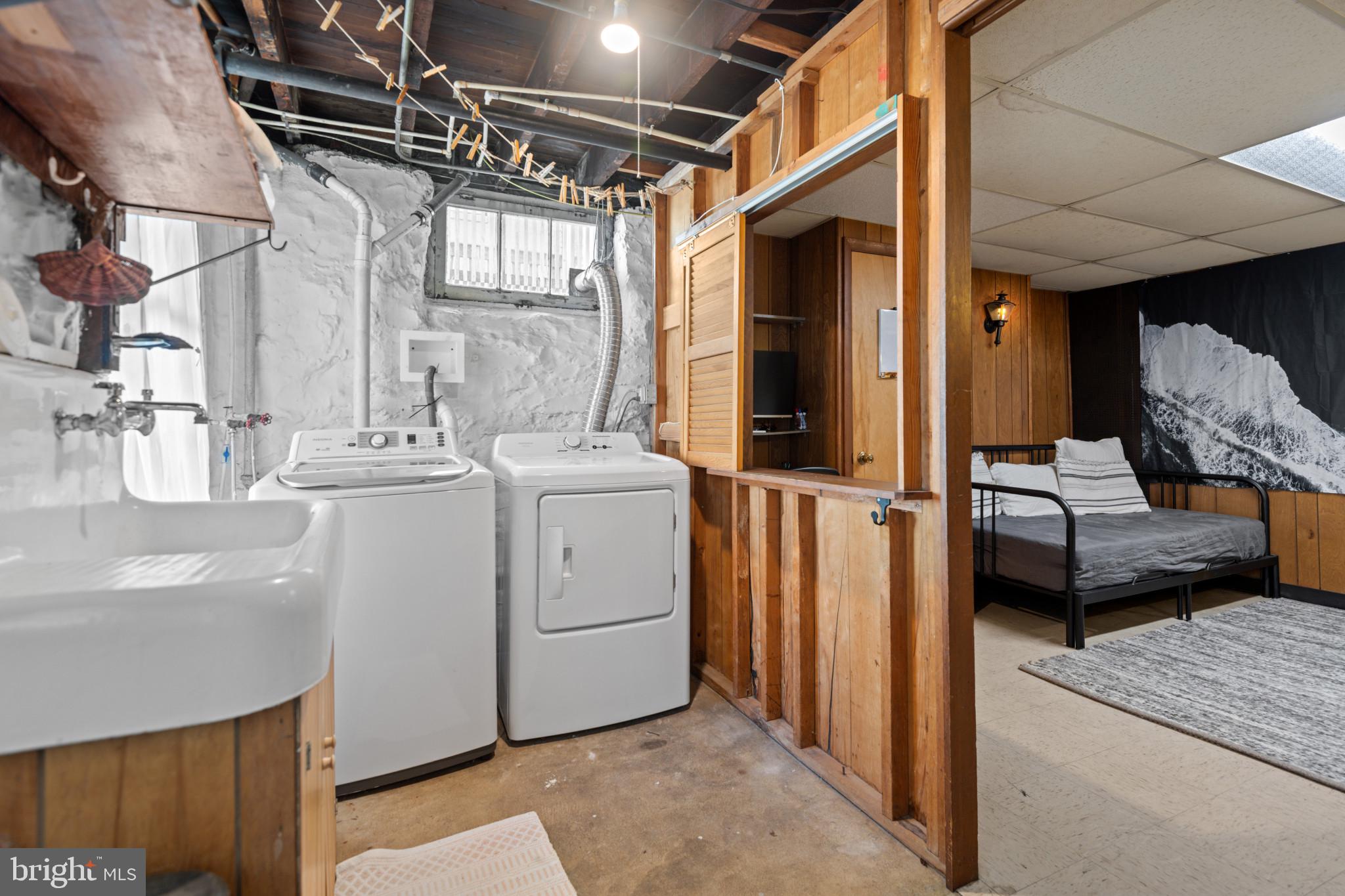 1228 West 37th Street Baltimore, MD 21211 - Photo 23 of 23 a utility room with dryer and washer