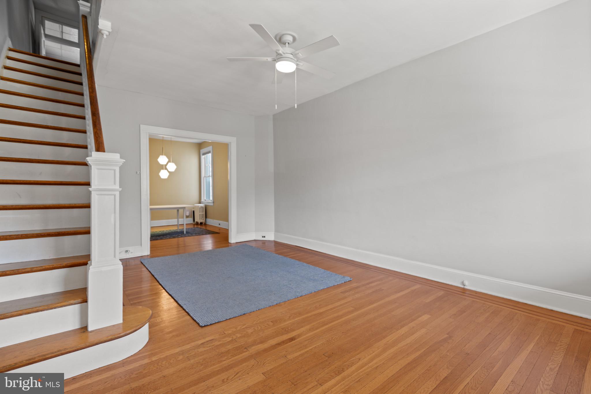 1228 West 37th Street Baltimore, MD 21211 - Photo 6 of 23 wooden floor in an empty room with a window