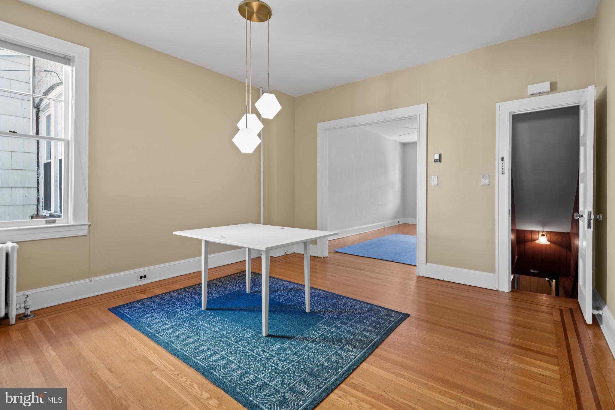 1228 West 37th Street Baltimore, MD 21211 - Photo 8 of 23 a view of a livingroom with furniture and wooden floor