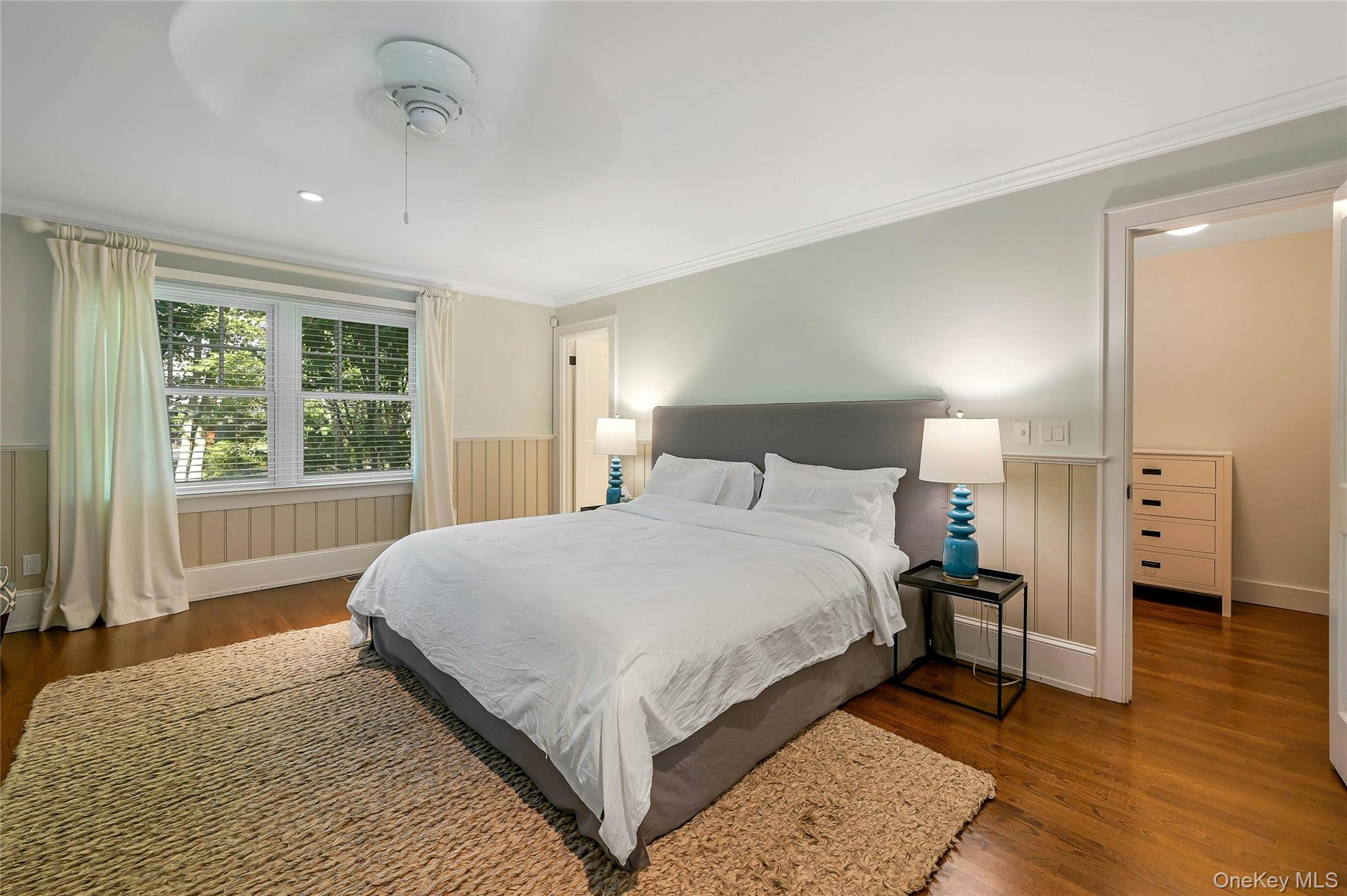 1600 Pine Tree Road Cutchogue, NY 11935 - Photo 11 of 27 a bedroom with a bed and a window