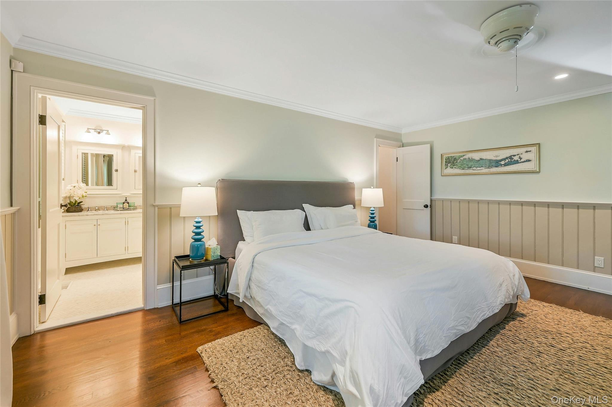 1600 Pine Tree Road Cutchogue, NY 11935 - Photo 12 of 27 a bedroom with a bed and a table