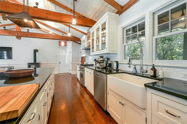 a kitchen with sink and stove