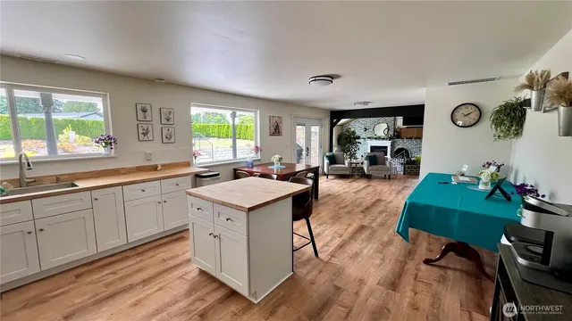 a view of a sign board with a yard