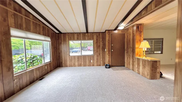 a view of a room with a large window