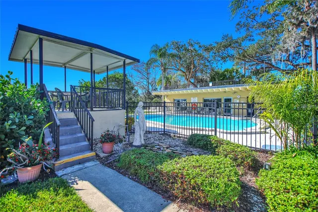 a view of a backyard with a patio