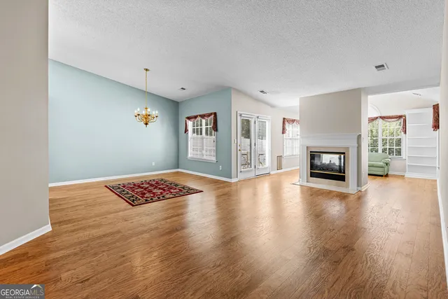 a view of livingroom with hardwood floor and window