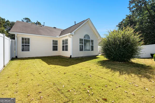 a view of a house with patio