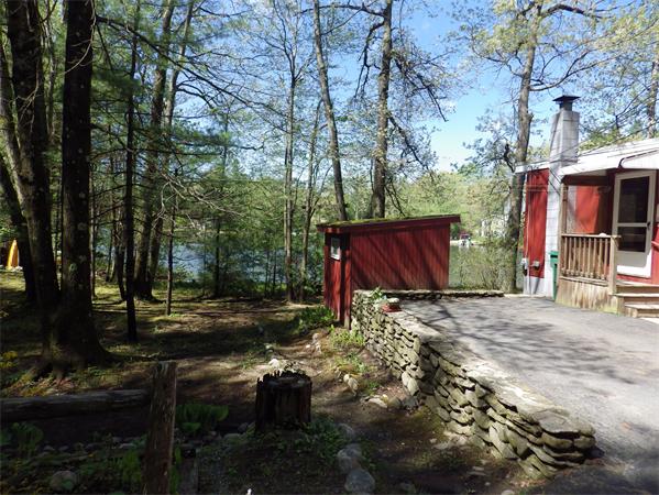 39 South Row Road Lunenburg, MA 01462 - Photo 23 of 30 a wooden house with tall trees