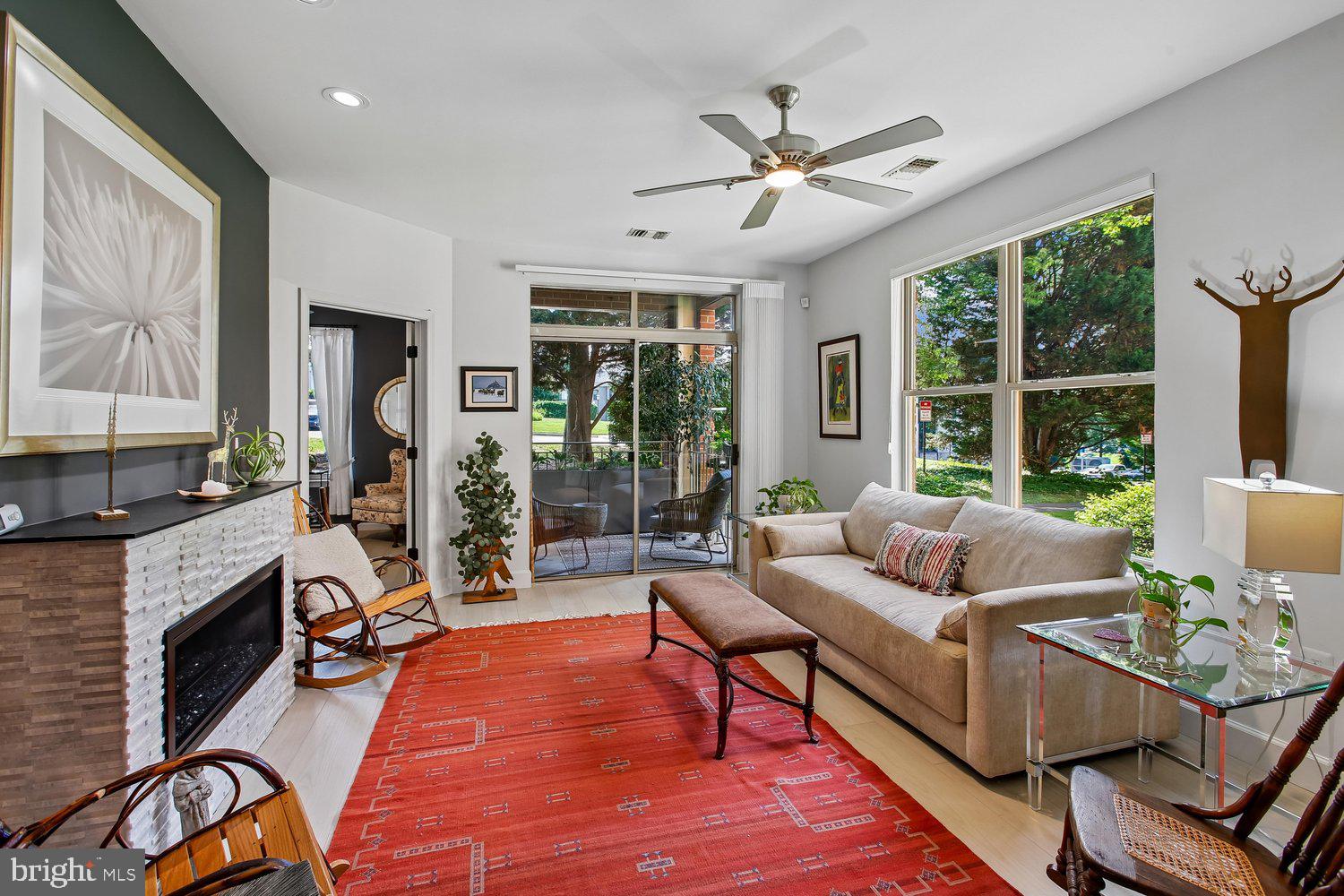 1855 Stratford Park Place, Unit 103 Reston, VA 20190 - Photo 17 of 49 Living Room full of natural light.