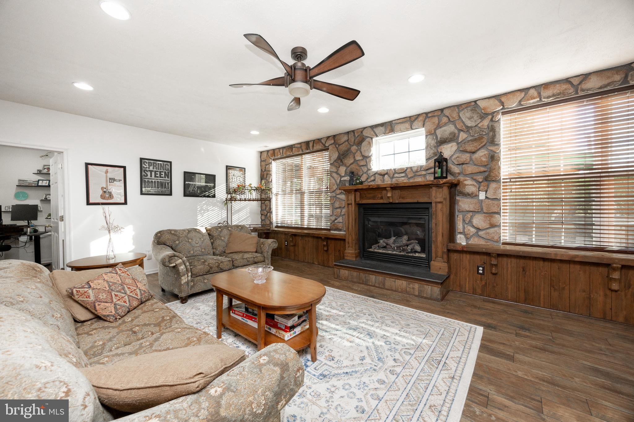 912 Nottingham Road Pottstown, PA 19465 - Photo 61 of 92 Basement fireplace w/stone wall & custom mantel