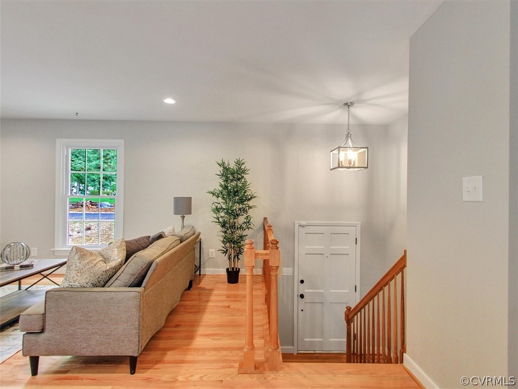 11921 Murray Hill Road Midlothian, VA 23113 - Photo 11 of 34 a living room with furniture and a potted plant