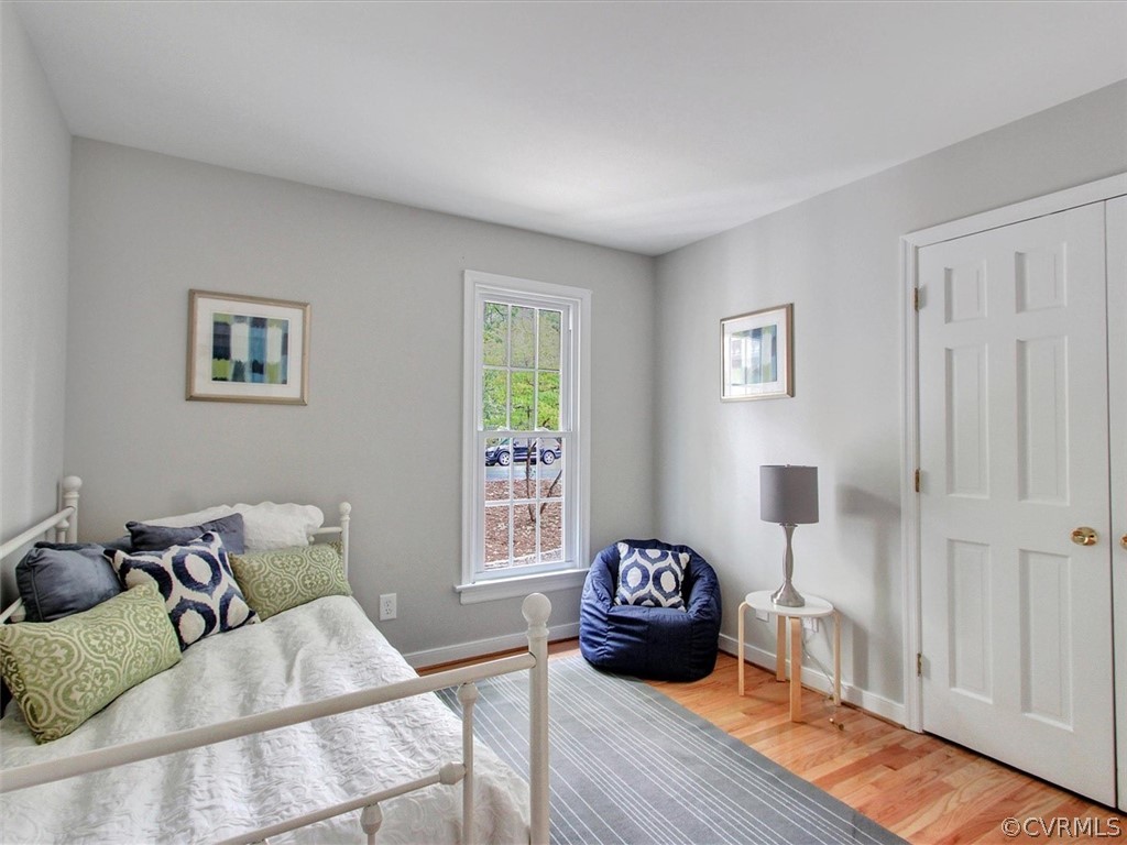 11921 Murray Hill Road Midlothian, VA 23113 - Photo 17 of 34 a living room with furniture and a wooden floor