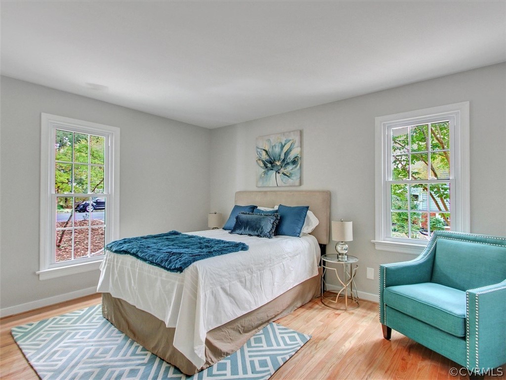 11921 Murray Hill Road Midlothian, VA 23113 - Photo 18 of 34 a bedroom with a bed window and couch