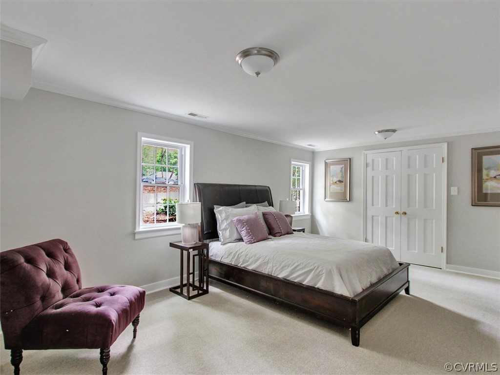 11921 Murray Hill Road Midlothian, VA 23113 - Photo 27 of 34 a bedroom with a bed and window