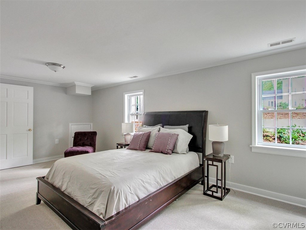 11921 Murray Hill Road Midlothian, VA 23113 - Photo 28 of 34 a bedroom with a bed and windows