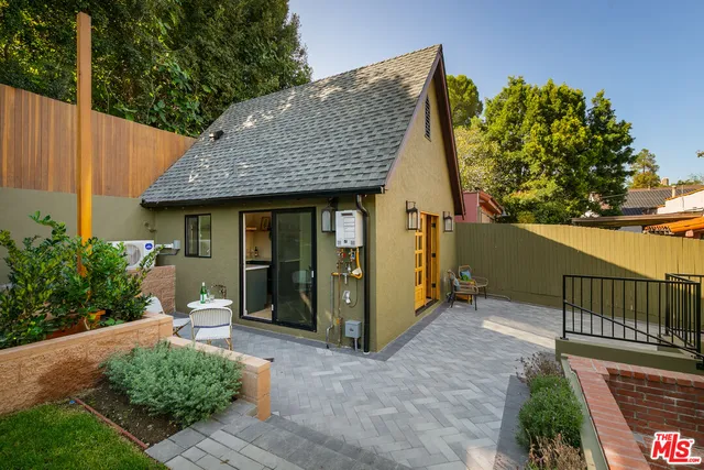 a front view of a house having yard