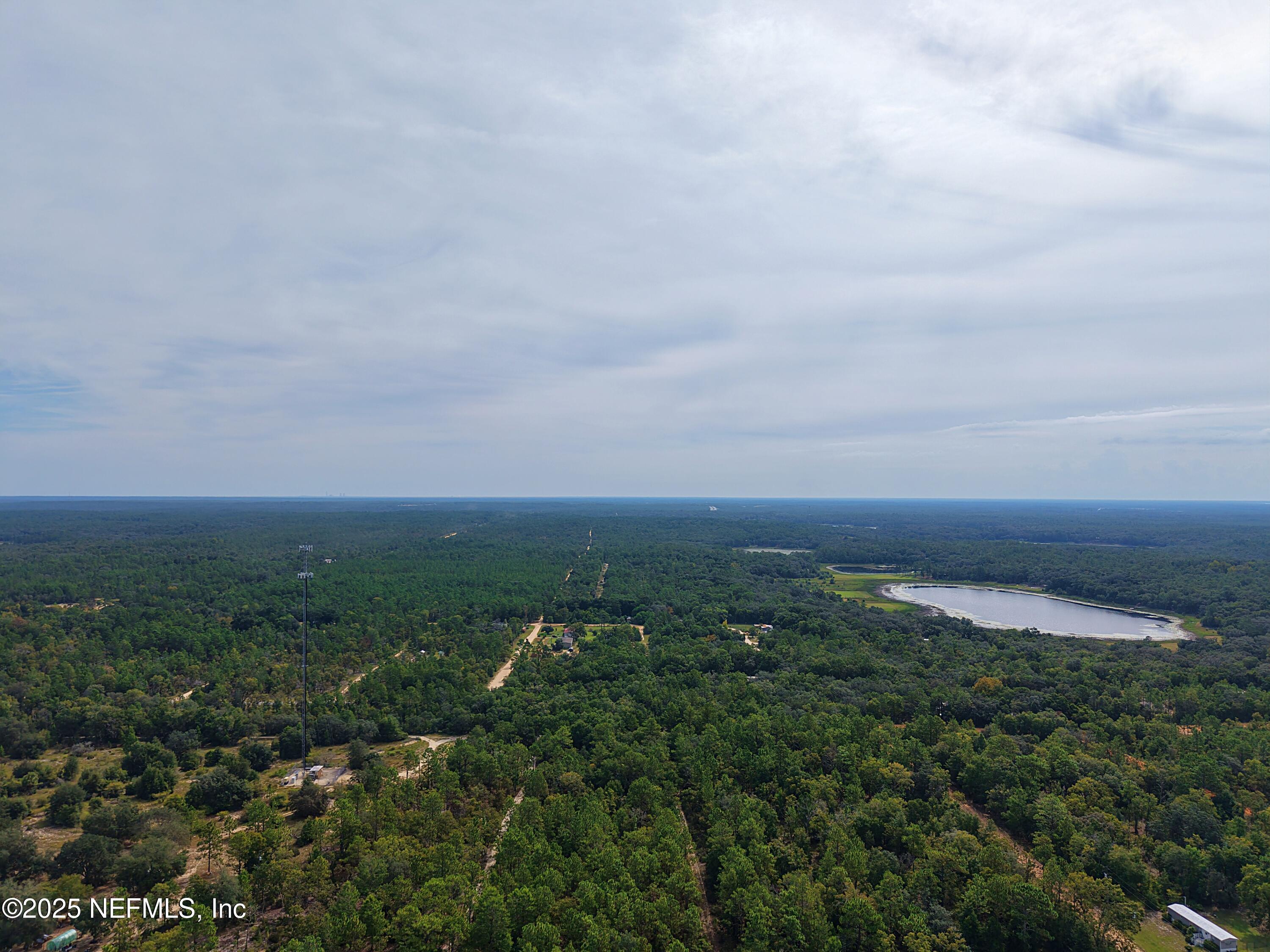 347 Chesser Monroe Road Hawthorne, FL 32640 - Photo 15 of 16 an aerial view of residential houses and outdoor space