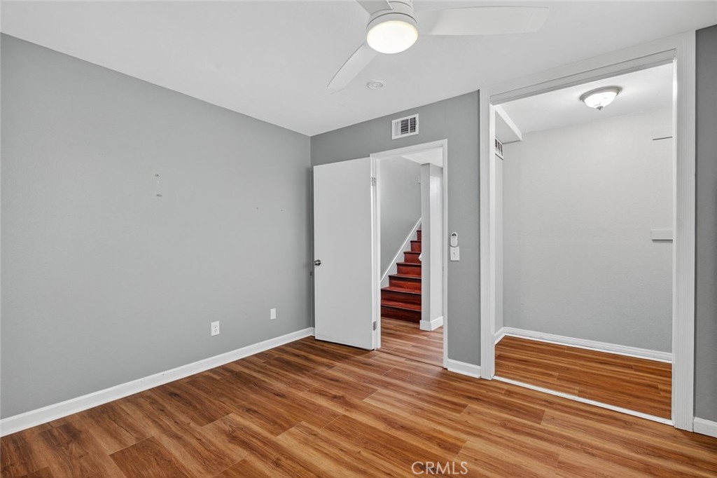 4060 Alto Street Oceanside, CA 92056 - Photo 25 of 56 a view of empty room with wooden floor and fan