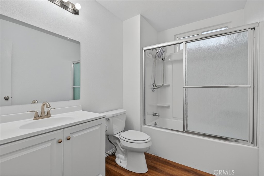 4060 Alto Street Oceanside, CA 92056 - Photo 27 of 56 a bathroom with a shower sink vanity mirror and toilet
