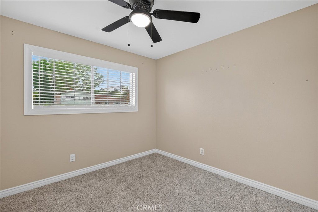4060 Alto Street Oceanside, CA 92056 - Photo 28 of 56 an empty room with a window and a fan