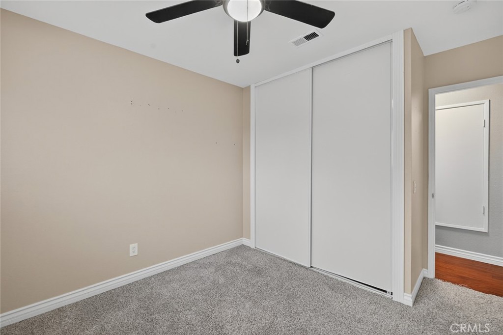 4060 Alto Street Oceanside, CA 92056 - Photo 31 of 56 an empty room with a ceiling fan
