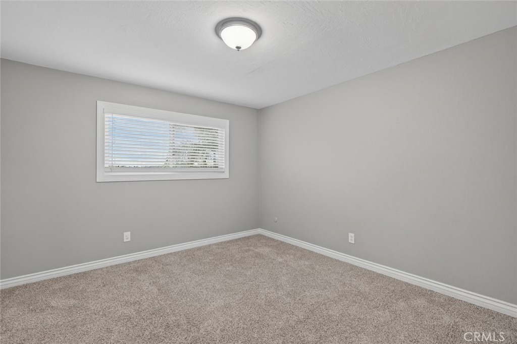 4060 Alto Street Oceanside, CA 92056 - Photo 36 of 56 an empty room with a window