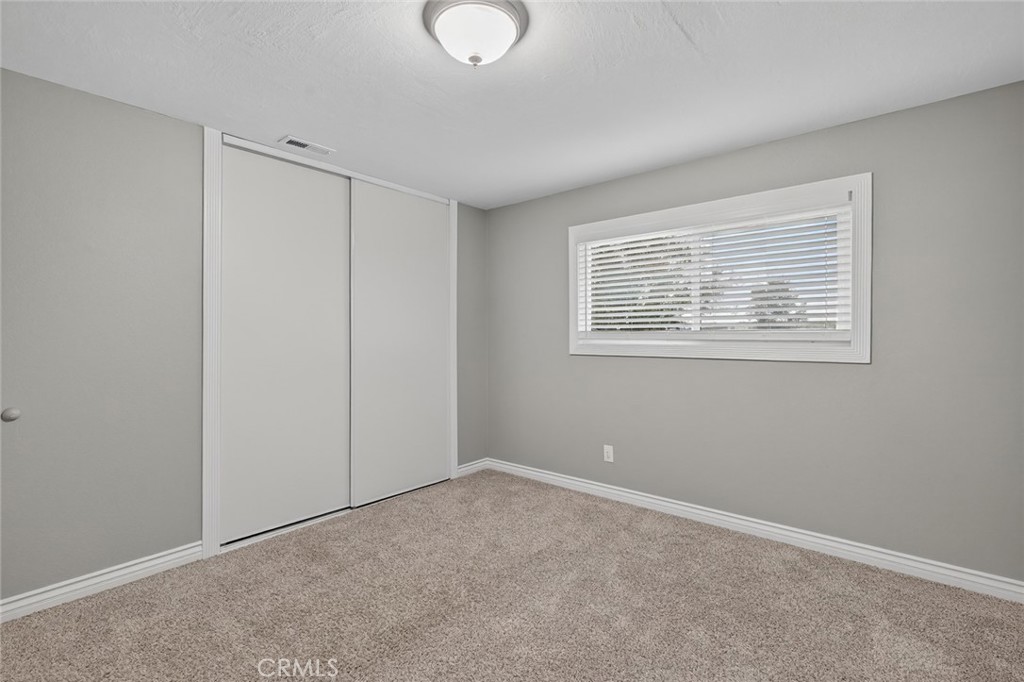 4060 Alto Street Oceanside, CA 92056 - Photo 37 of 56 a view of an empty room with a window