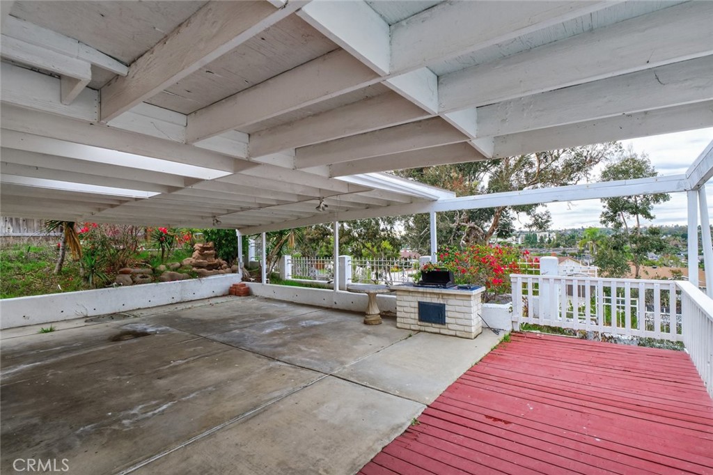 4060 Alto Street Oceanside, CA 92056 - Photo 40 of 56 a view of a patio with a dining table and chairs