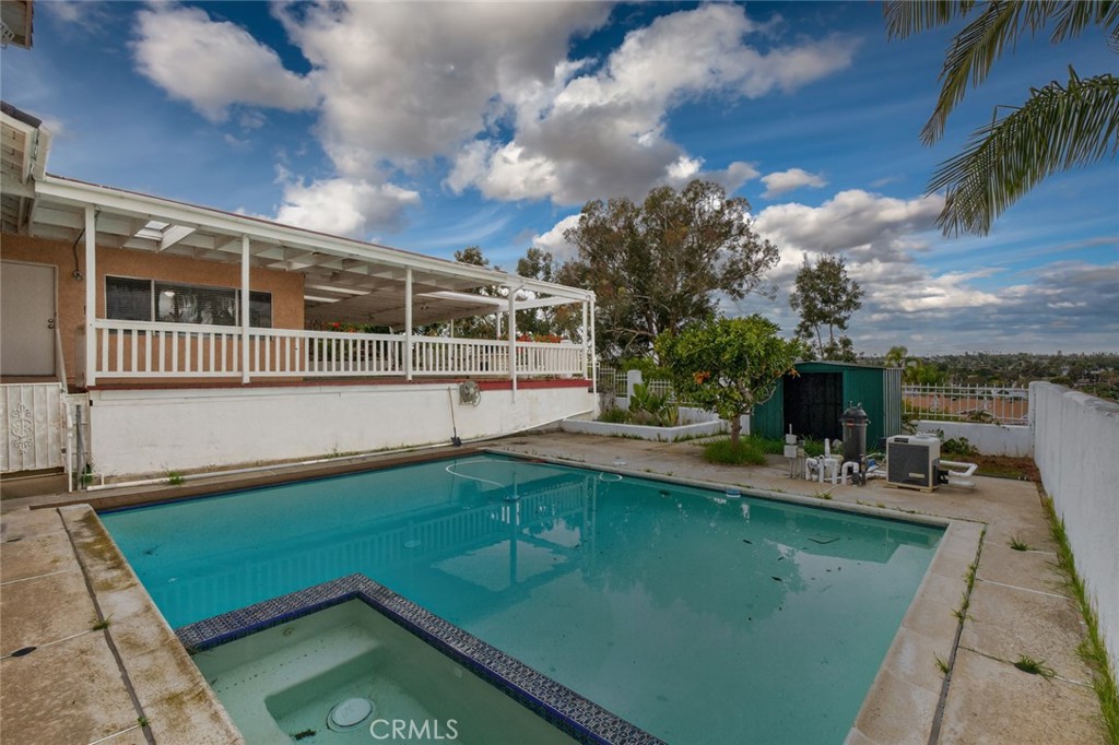 4060 Alto Street Oceanside, CA 92056 - Photo 47 of 56 an outdoor view of a house with swimming pool