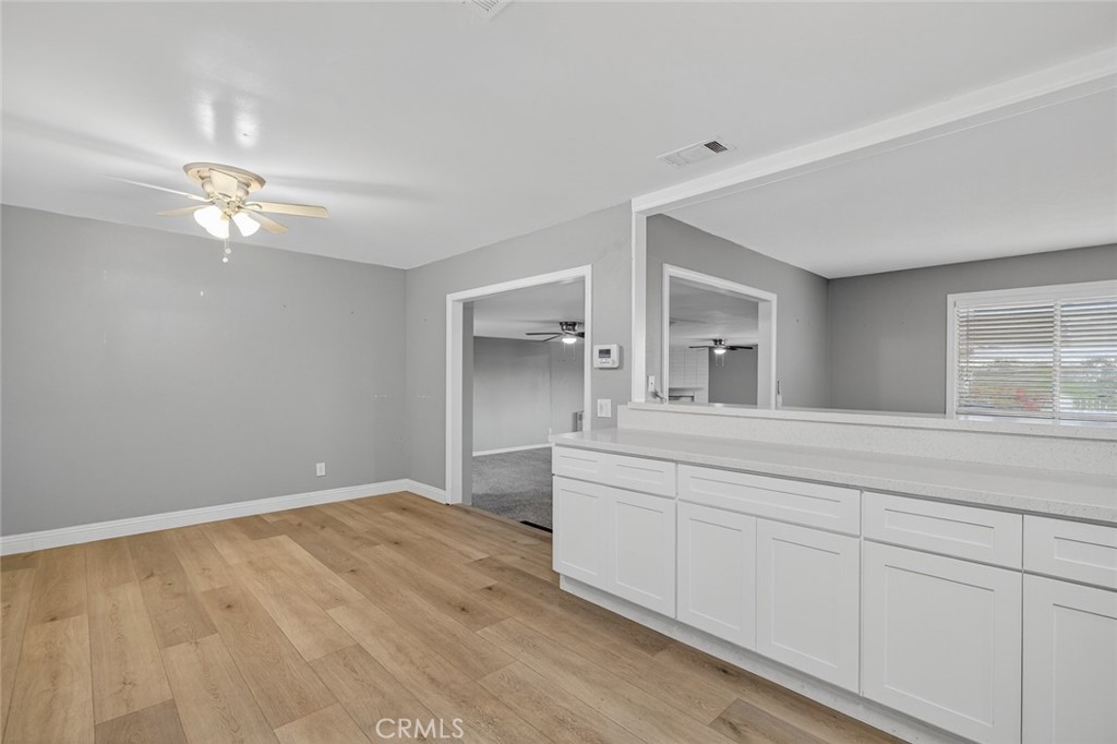 4060 Alto Street Oceanside, CA 92056 - Photo 8 of 56 a view of empty room with window and ceiling fan