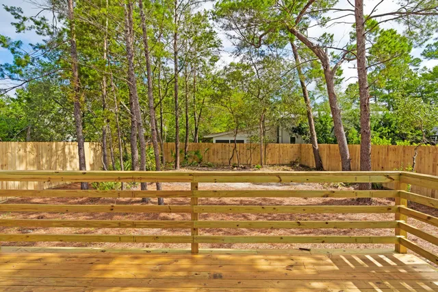 a view of a swimming pool with an outdoor space and seating area