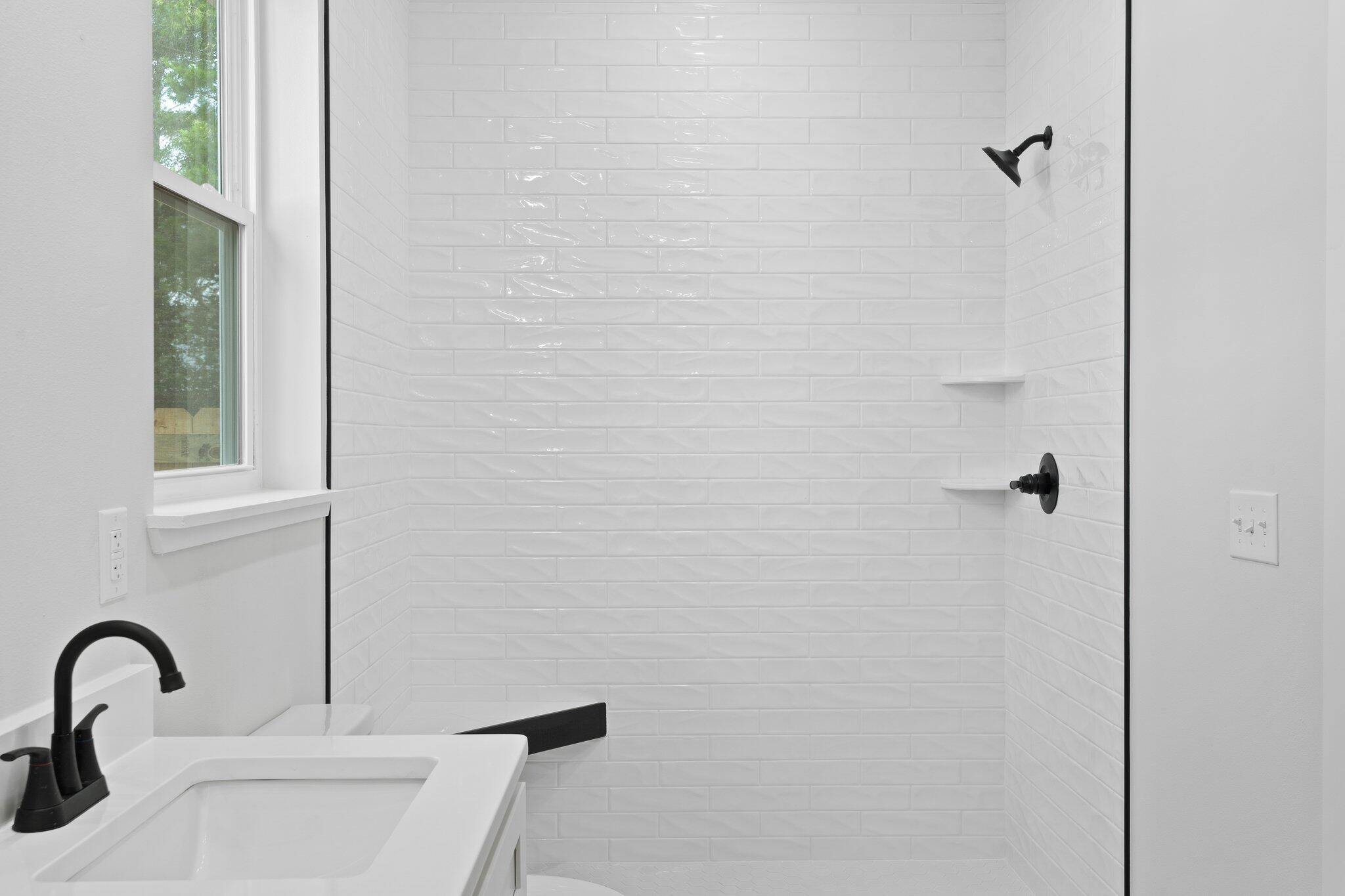 45 Laurel Oak Lane Santa Rosa Beach, FL 32459 - Photo 27 of 30 a bathroom with a sink and mirror