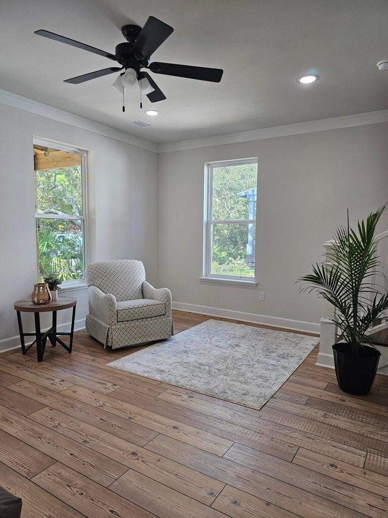45 Laurel Oak Lane Santa Rosa Beach, FL 32459 - Photo 8 of 30 a living room with furniture and a potted plant