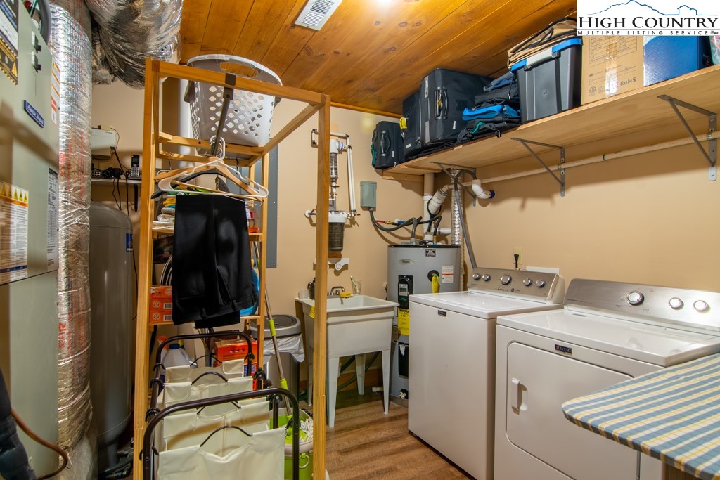 232 Bertie Circle Piney Creek, NC 28663 - Photo 45 of 50 a view of a storage & utility room with washer and dryer