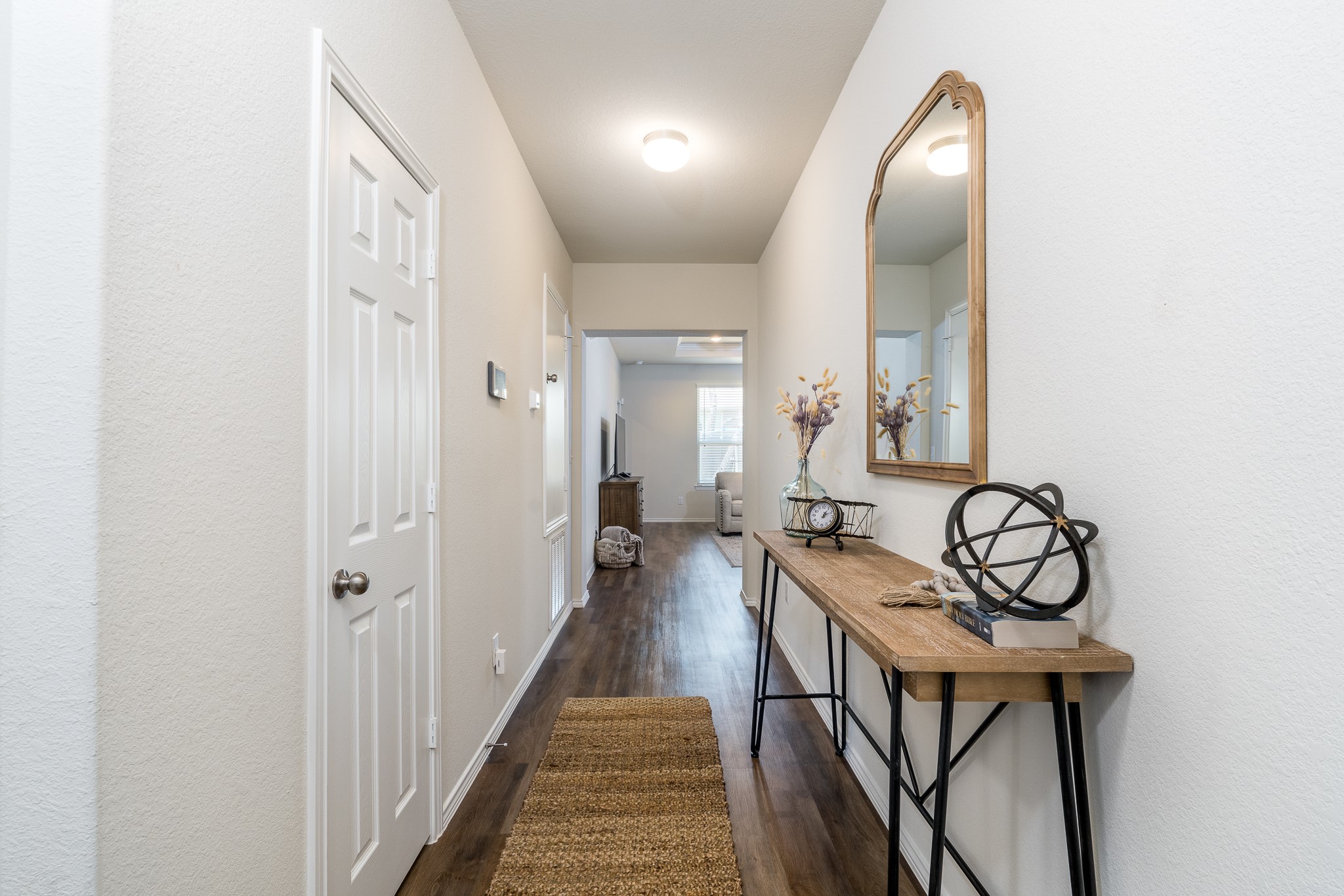 4256 Pine Still Road Conroe, TX 77304 - Photo 5 of 21 a view of a hallway with couches